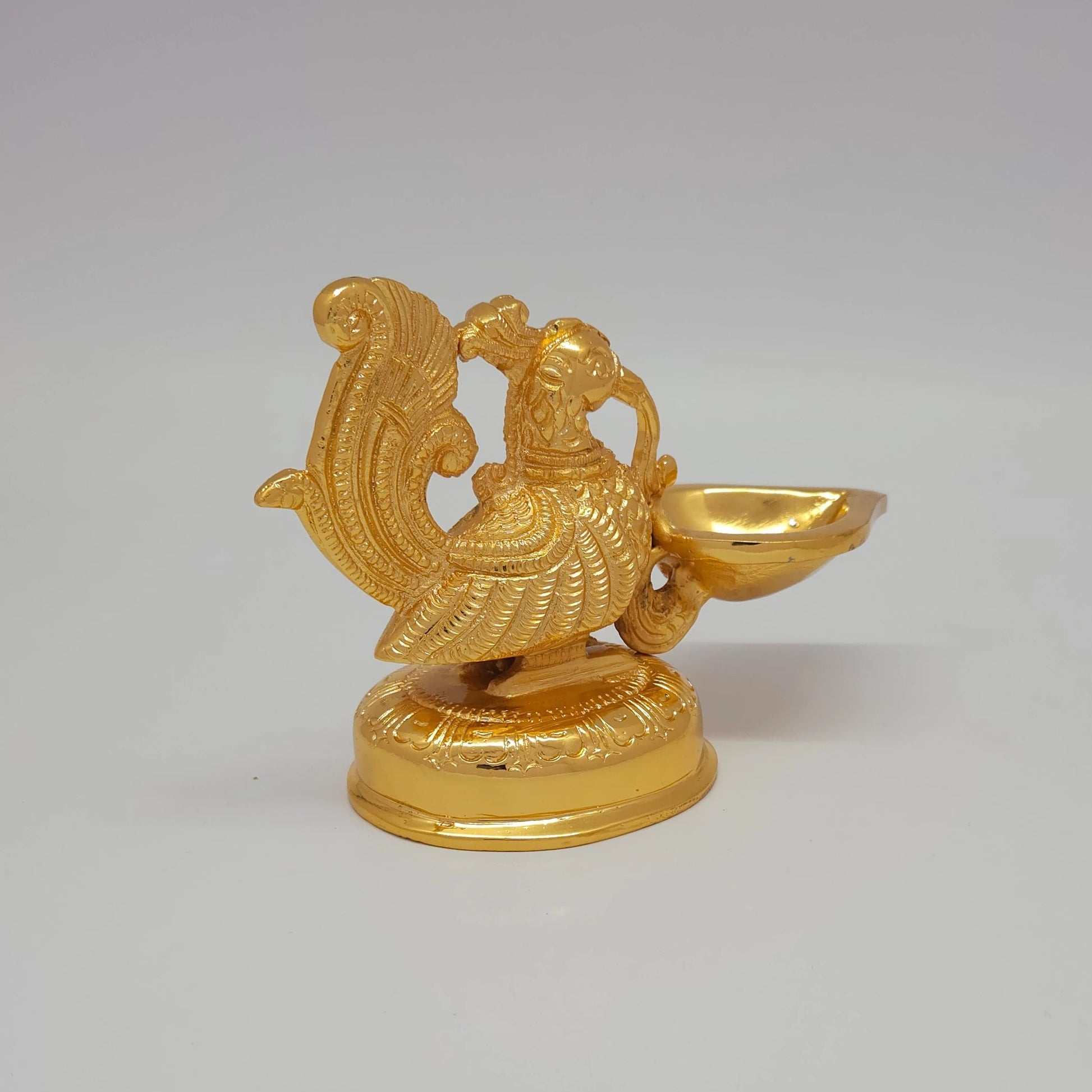 Sri Swaminathan and Co brass decorative peacock showpiece gold finish 610g back pose full rear view showing reverse of fanned tail feathers and circular base