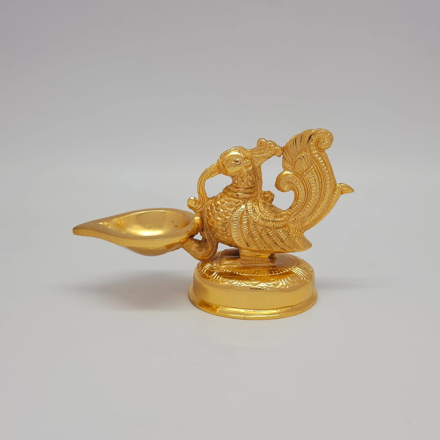 Sri Swaminathan and Co premium brass decorative Mayura peacock diya showpiece sculpture gold powder coated finish 610g weight 16cm length front straight profile view