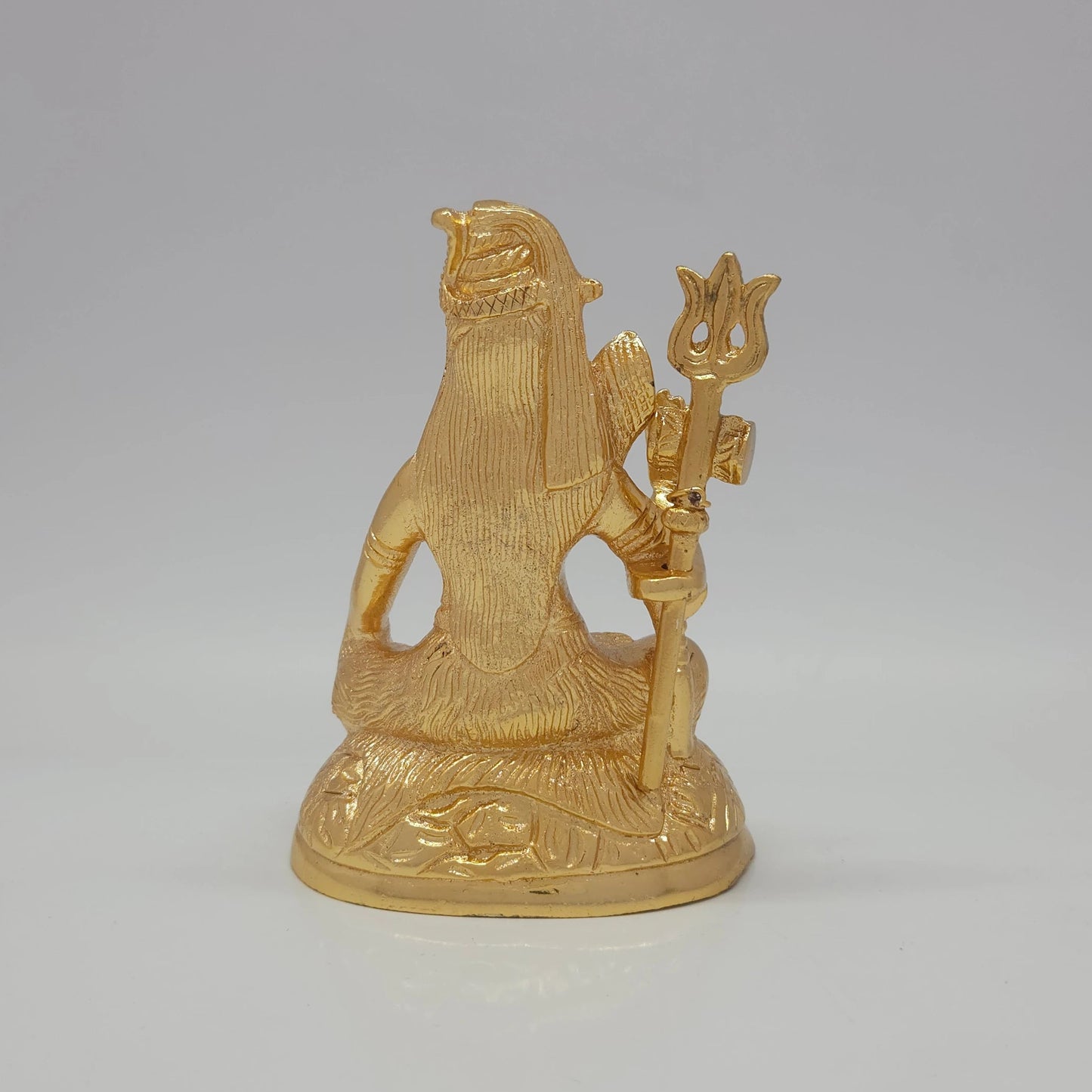 Sri Swaminathan and Co brass miniature seated Shiva statue gold finish 550g weight back pose full rear view showing reverse of cascading matted hair lines and thick base platform