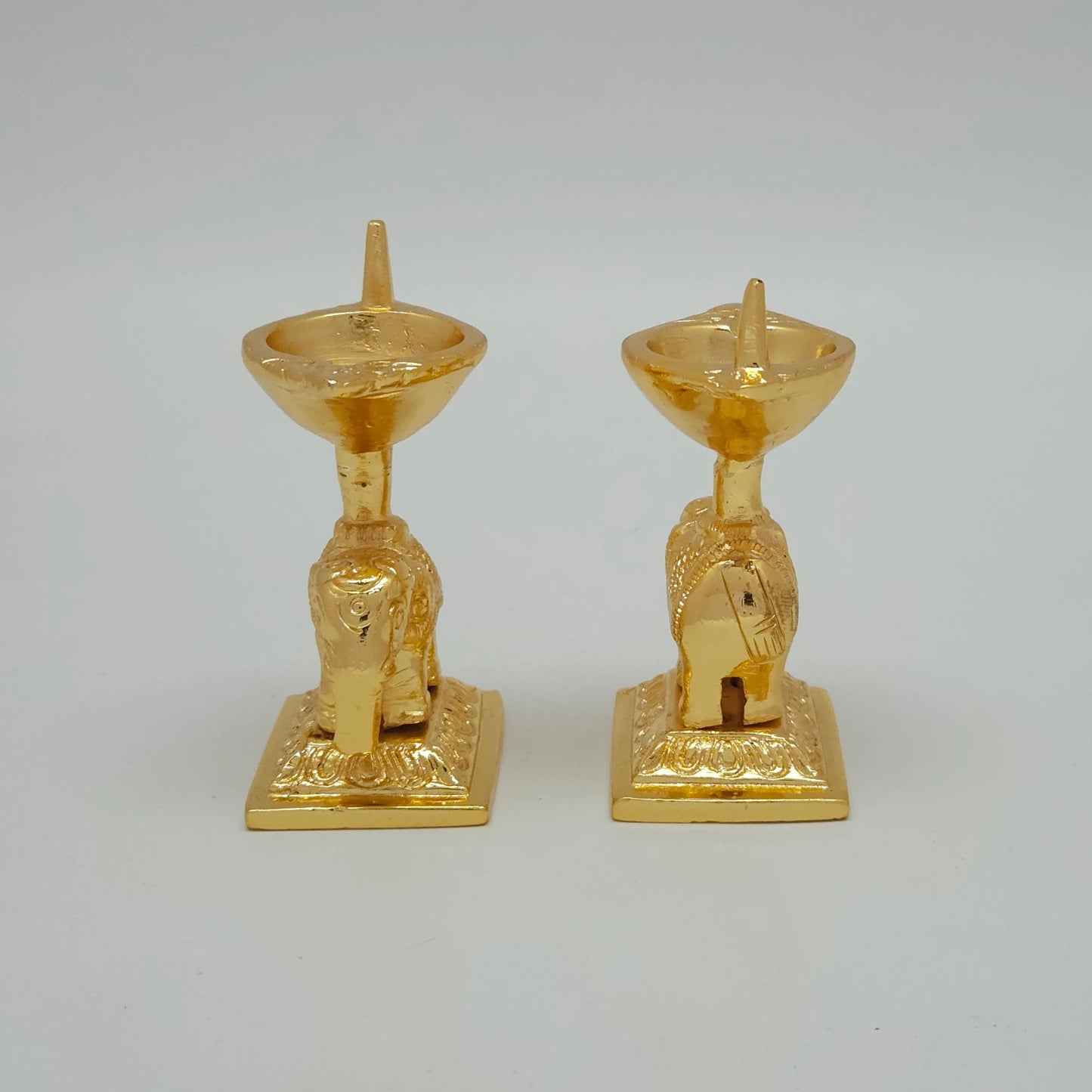 Sri Swaminathan and Co brass elephant diya stand gold powder coated 3 inch 8cm height back pose full rear view showing reverse of elephant body and oil lamp rim