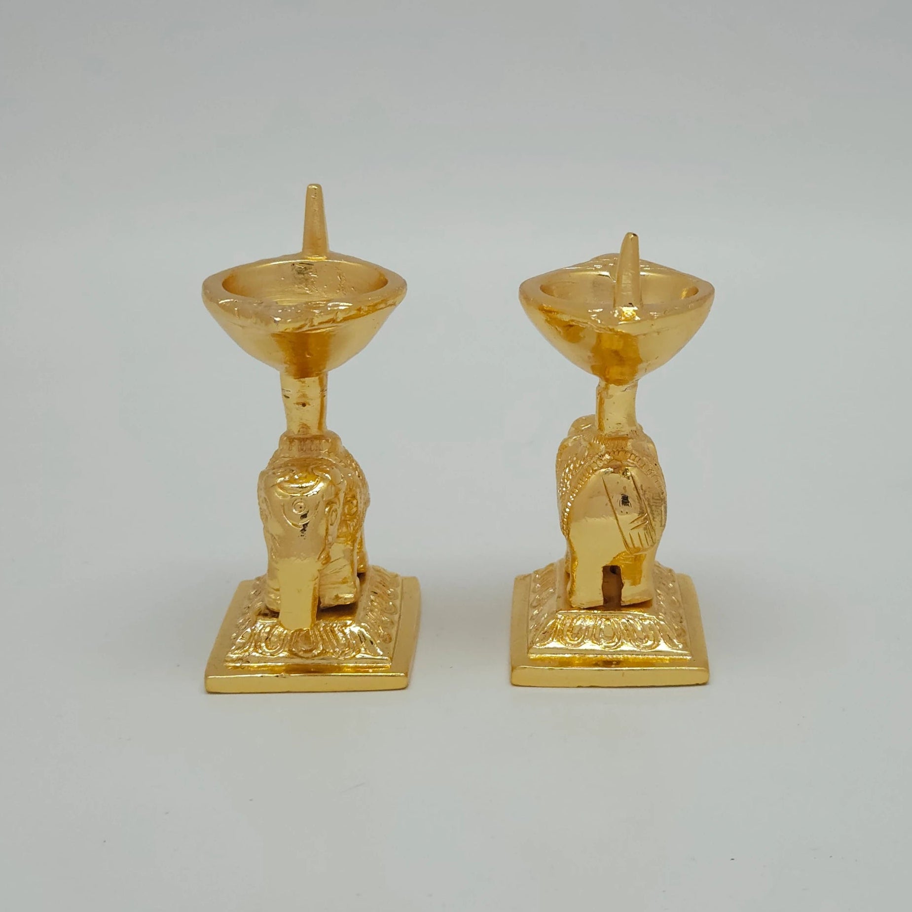 Sri Swaminathan and Co brass elephant diya stand gold powder coated 3 inch 8cm height back pose full rear view showing reverse of elephant body and oil lamp rim