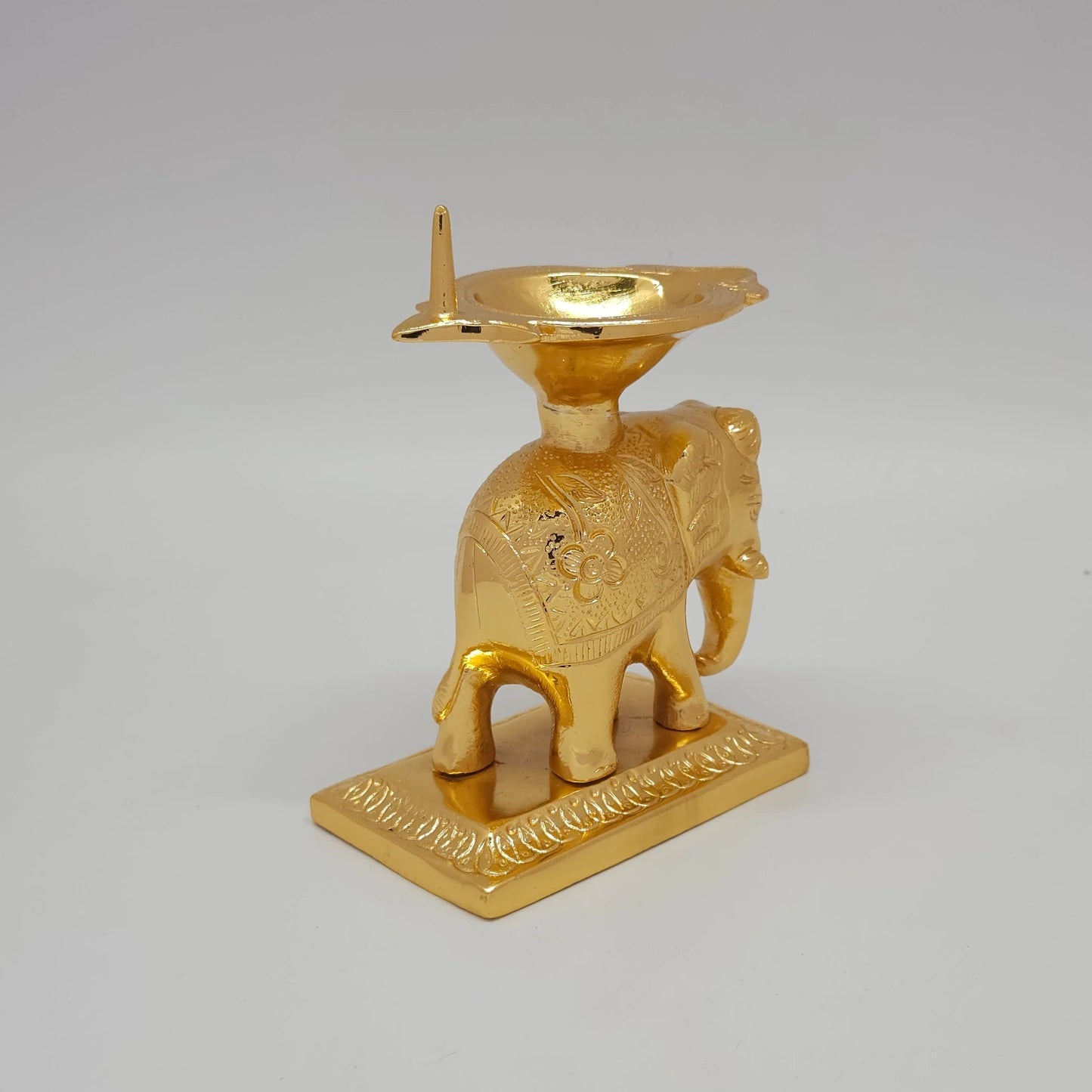 Sri Swaminathan and Co brass elephant diya stand gold powder coated 6 inch 14cm height back pose 45-degree view showing reverse of elephant body and oil lamp rim