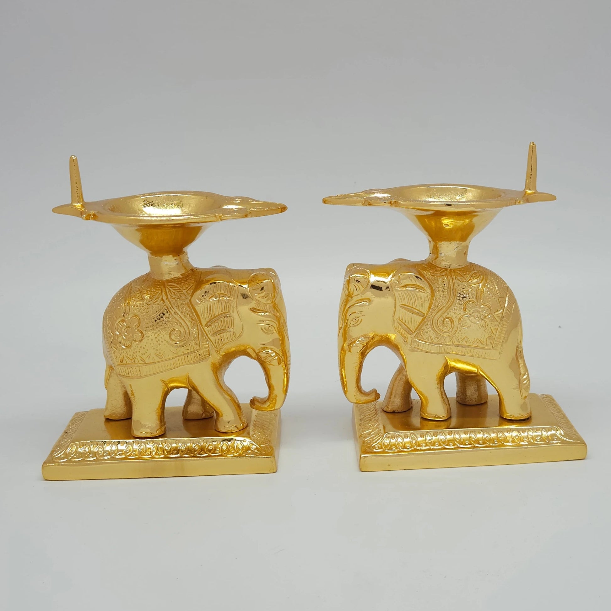 Sri Swaminathan and Co brass elephant diya stand gold powder coated 6 inch 14cm height side posture view of pair 
