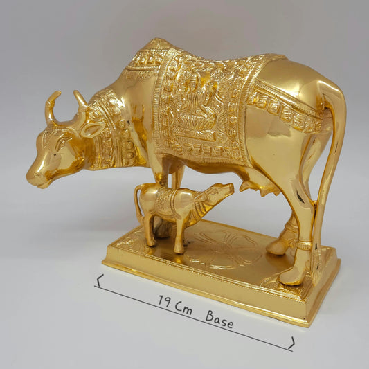 Sri Swaminathan and Co brass grand Kamadhenu cow statue 4.5kg 45 degree pose corner view focusing on the deep etched Goddess Lakshmi back blanket and calf stance