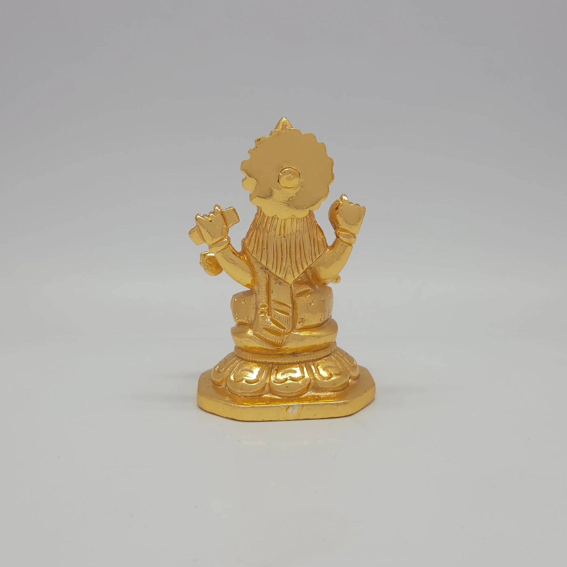 Sri Swaminathan and Co brass miniature Kalaimagal Saraswathi statue gold finish 300g weight back pose full rear view showing reverse of tiered crown and octagonal base plate
