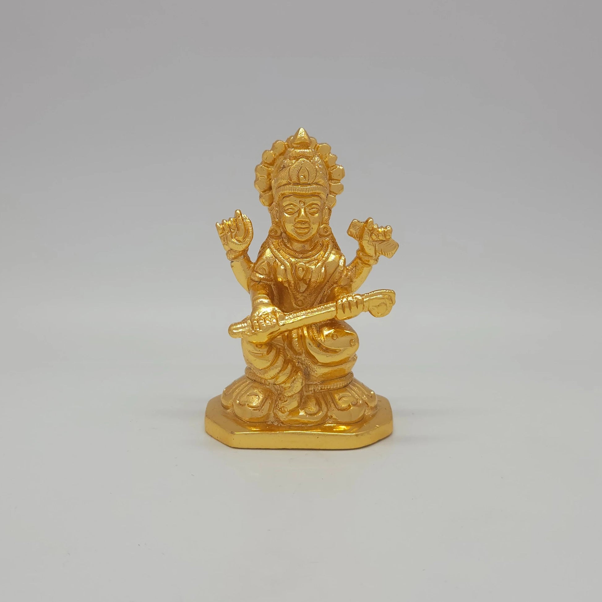 Sri Swaminathan and Co premium brass seated Goddess Kalaimagal Saraswathi statue veena octagonal base gold finish 300g weight 8cm height front view size guide