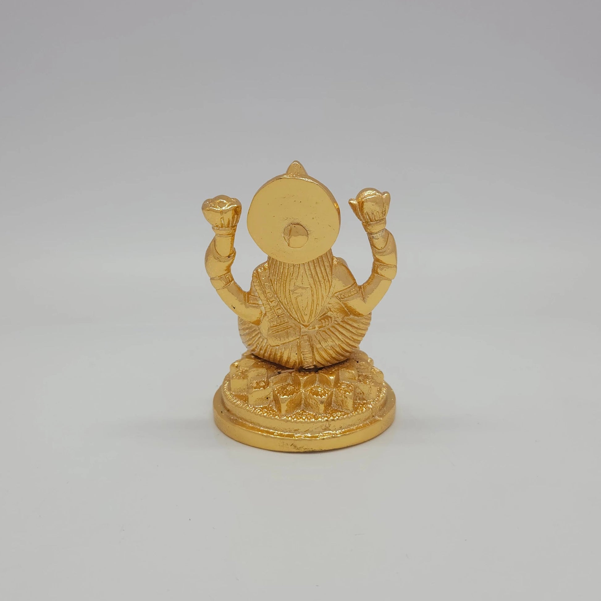 Sri Swaminathan and Co brass miniature Lalitasana Lakshmi statue gold finish 230g weight back pose full rear view showing reverse of tiered halo crown and double stepped base platform
