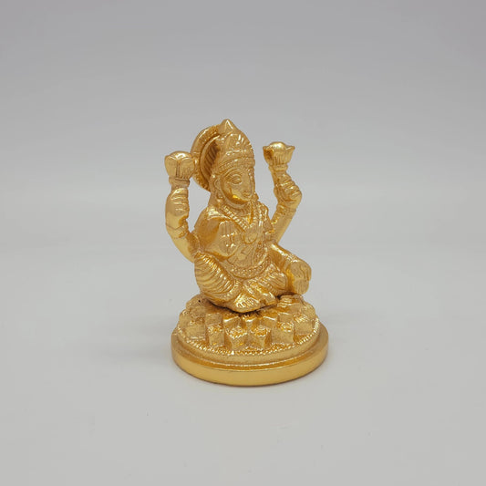 Sri Swaminathan and Co brass miniature Lalitasana Lakshmi statue gold finish 230g weight 45 degree right pose corner view focusing on protective abhaya mudra hand and double tiered peedam diameter