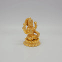 Sri Swaminathan and Co brass miniature Mahalakshmi statue gold finish 200g weight 45 degree right pose corner view focusing on protective abhaya mudra hand and circular lotus peedam diameter