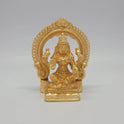 Sri Swaminathan and Co brass miniature Mahalakshmi statue gold finish 250g weight back pose full rear view showing reverse of flat thiruvatchi temple arch frame and rectangular pedestal