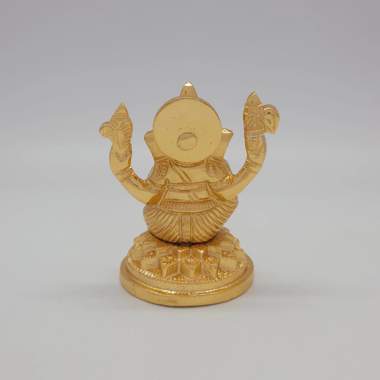 Sri Swaminathan and Co brass miniature Petal Series Ganesha statue gold finish 250g weight back pose full rear view showing reverse of detailed crown and circular base plate