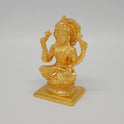 Sri Swaminathan and Co brass Lakshmi statue gold powder coated 4 inch 11cm height 45 degree left pose corner view highlighting the chiseled lotus bloom stalk detail