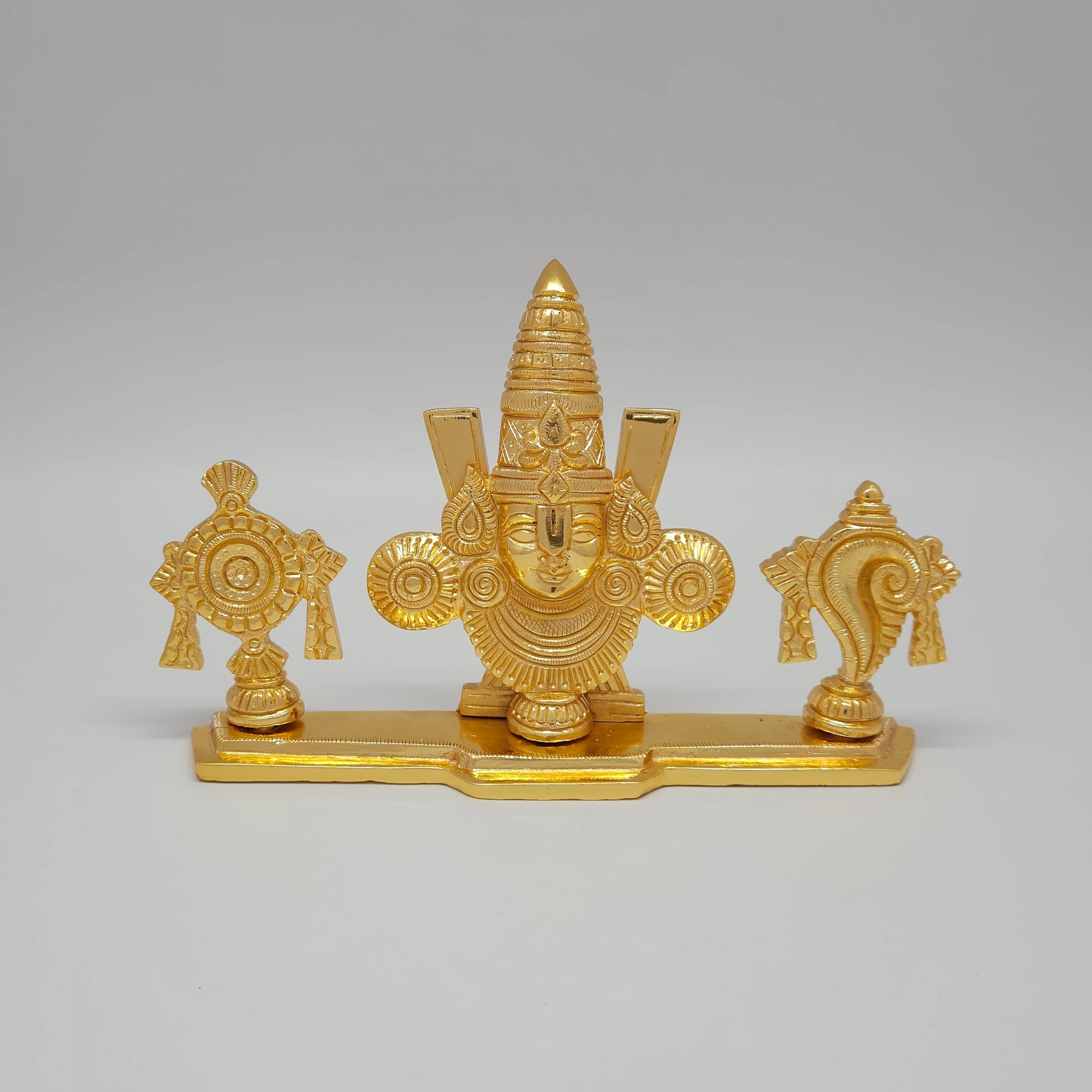 Sri Swaminathan and Co premium brass Tirupati Balaji face with Sudarshana Chakra and Panchajanya Shankha namam stand gold powder coated finish 14cm height front straight profile view