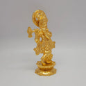 Sri Swaminathan and Co brass Krishna statue gold powder coated 8 inch 20cm height 45 degree left pose corner view highlighting the hand placement on the bansuri flute detail