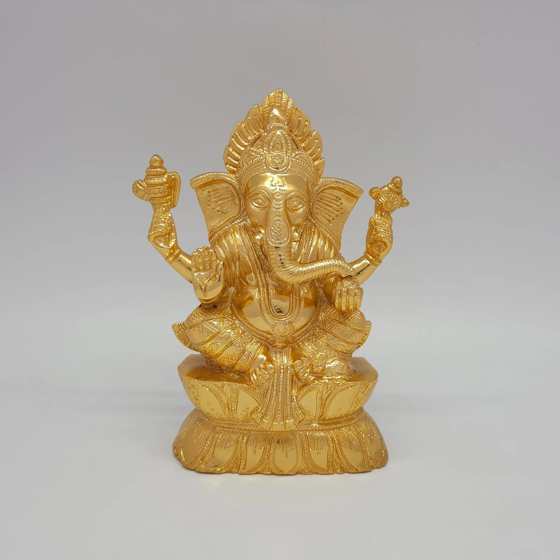 Sri Swaminathan and Co premium brass seated Ganesha statue holding traditional pasha noose and ankusha goad gold powder coated finish 1.580kg weight 18.5cm height front straight profile view