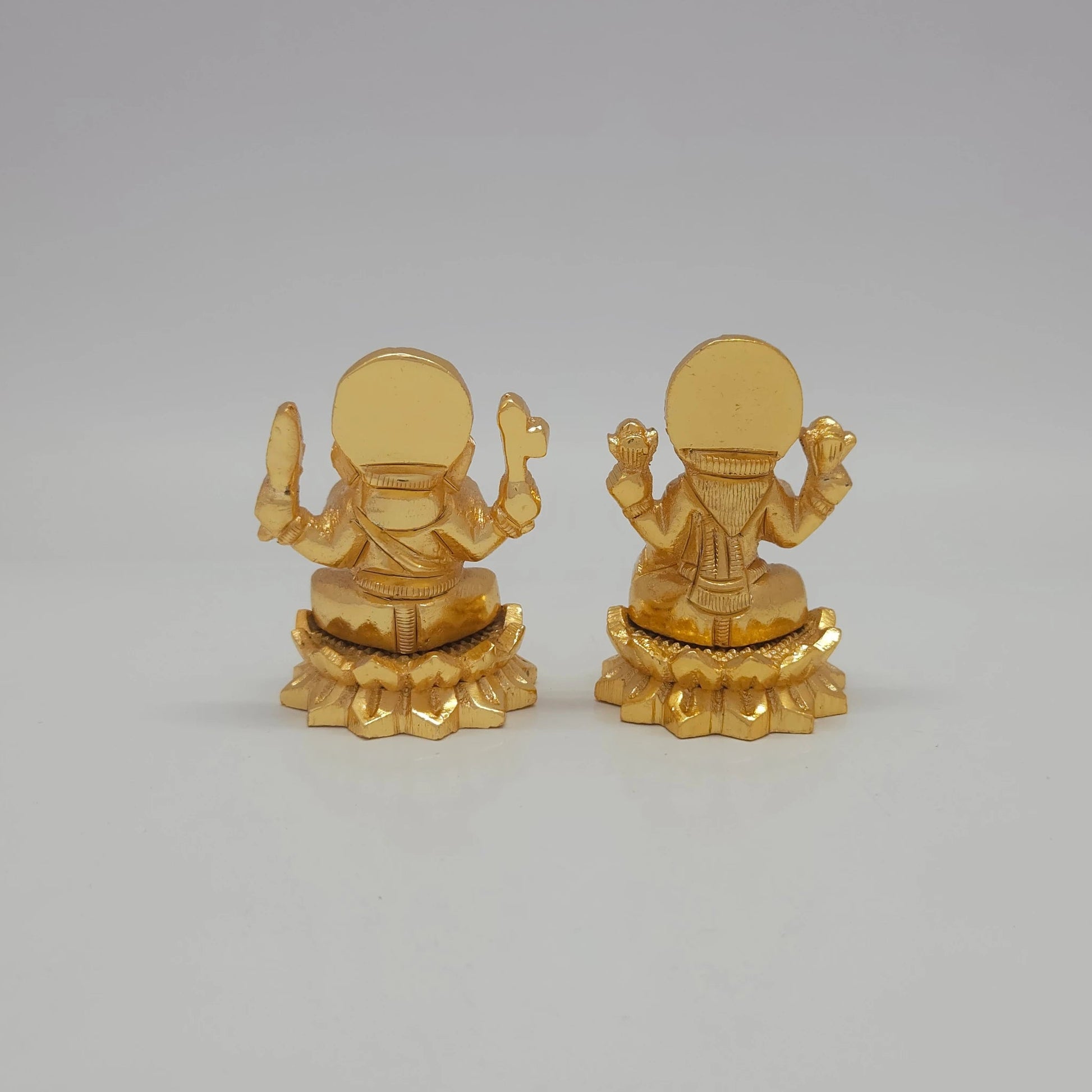 Sri Swaminathan and Co small gold finish Lakshmi statue 110g weight back pose rear angle view tracking the circular sunburst halo disc lines and reverse side base plates