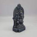Sri Swaminathan and Co paper mesh Ganesha statue stone finish 16cm height 45 degree right pose corner view focusing on front trunk curve toward modak sweet and base depth