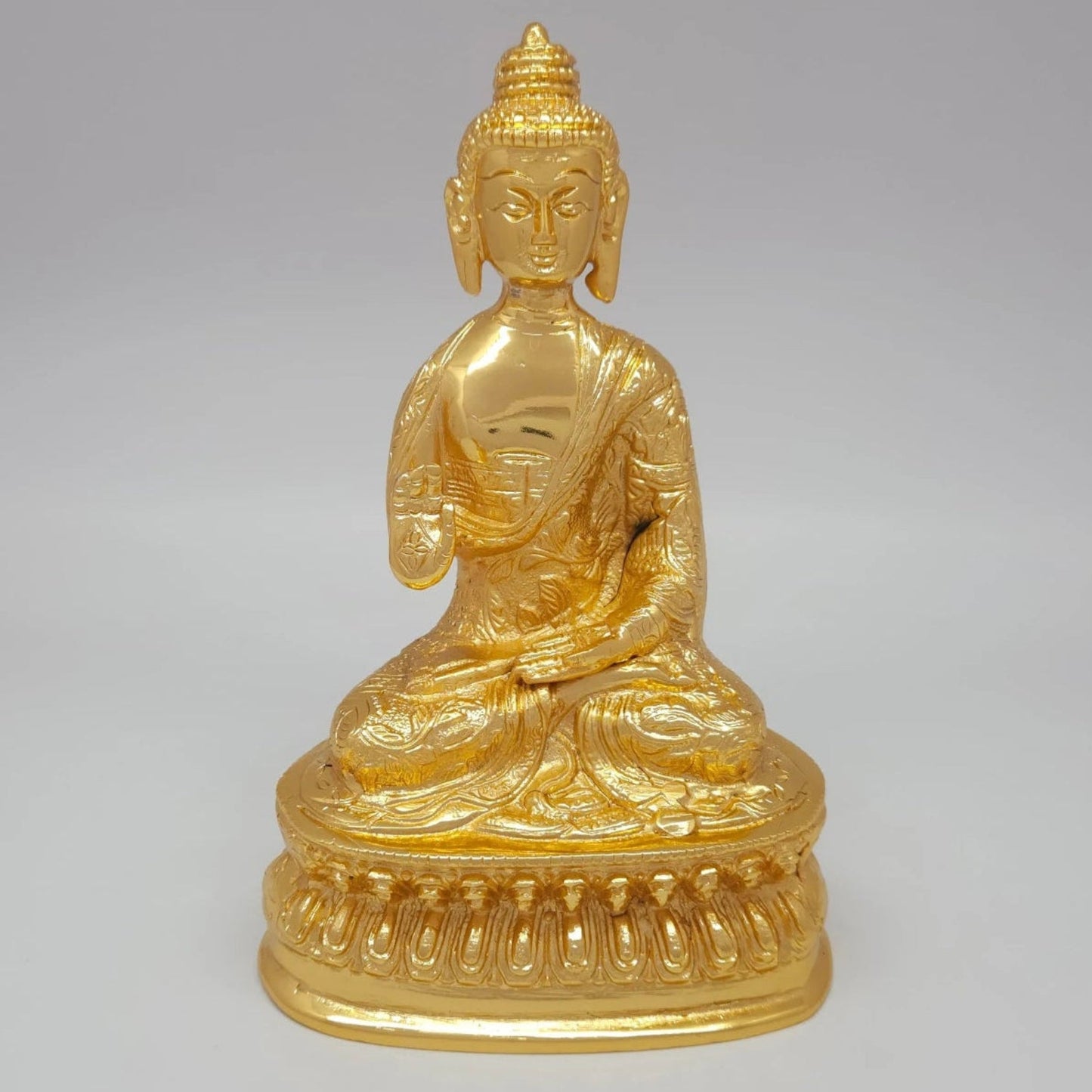 Front view of the 20cm / 8-inch premium gold powder-coated hollow brass Siddhartha statue showing the circular logic hand pose for Buddha Purnima.