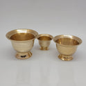Trio cluster arrangement layout of traditional pure brass chandan vattil cups showcasing small, medium, and large size variants.
