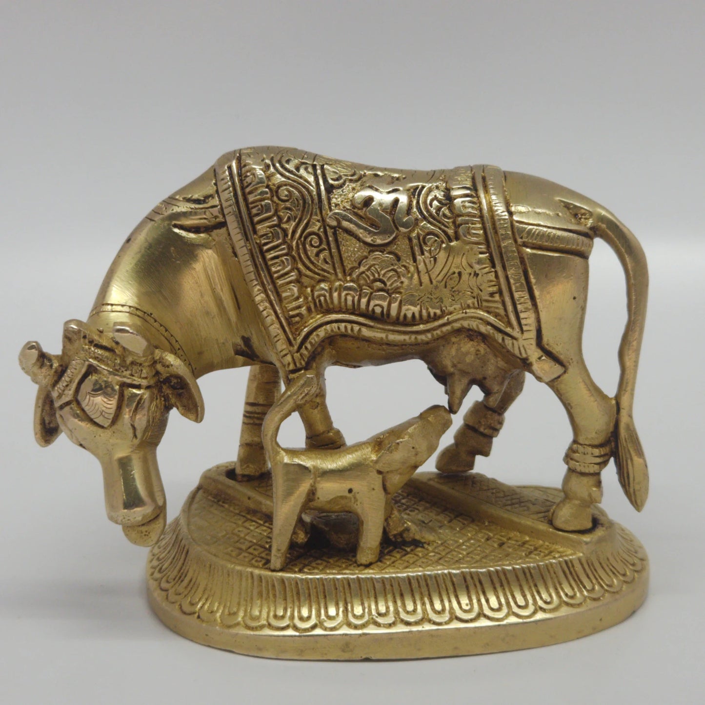 Traditional brass Kamadhenu idol with calf for spiritual gifting