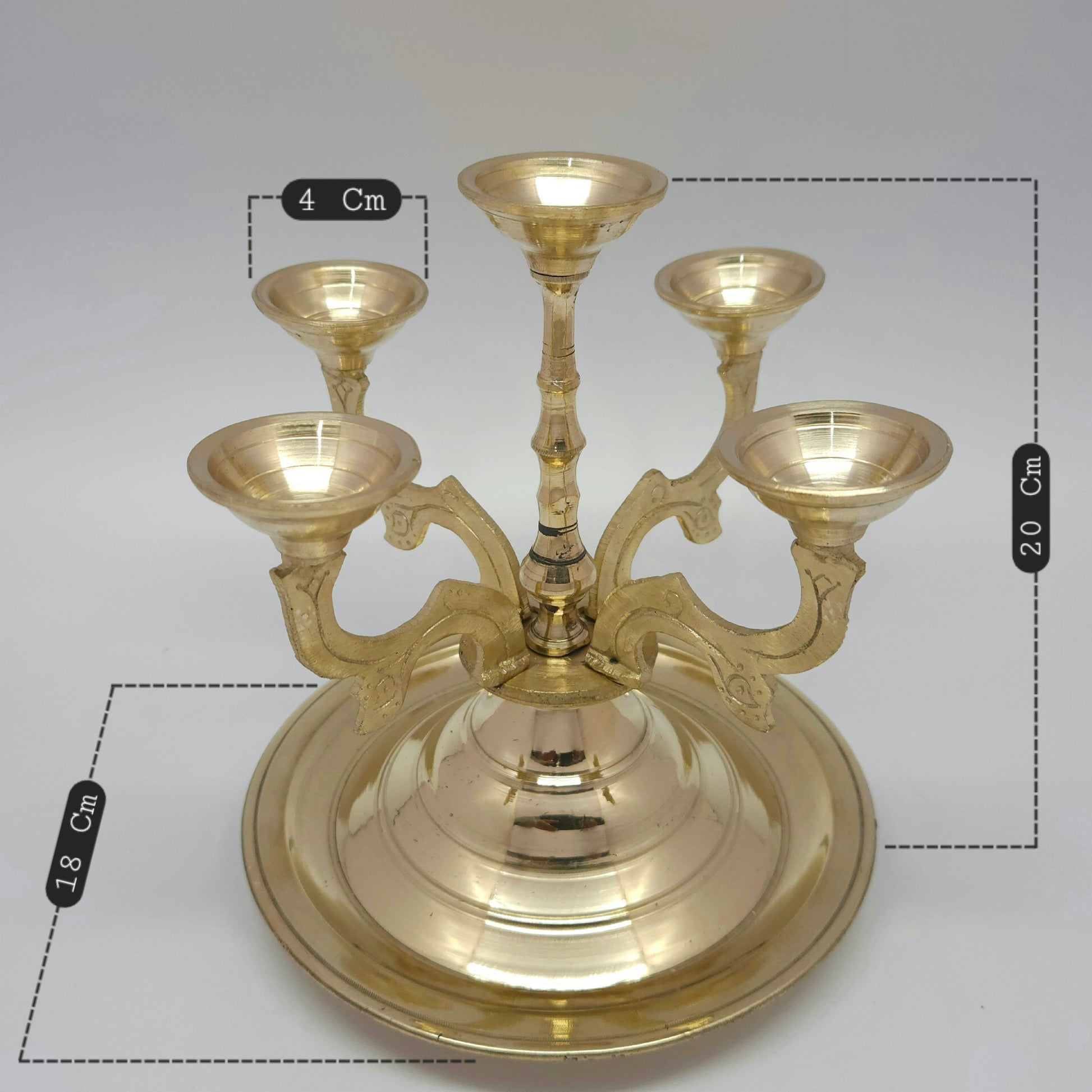 Heavy premium brass 5 face karpoora harathi stand held during deeparadhanai rituals, showcasing traditional Kumbakonam craftsmanship for temple donations with Dimensions