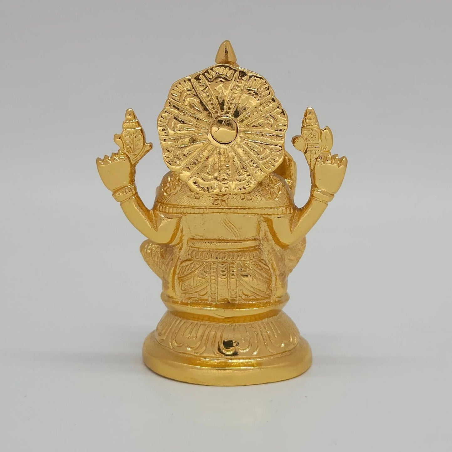 Vigneshwara Gold Idol Back View Sunburst Lotus Halo Round Pedestal Base Craftsmanship