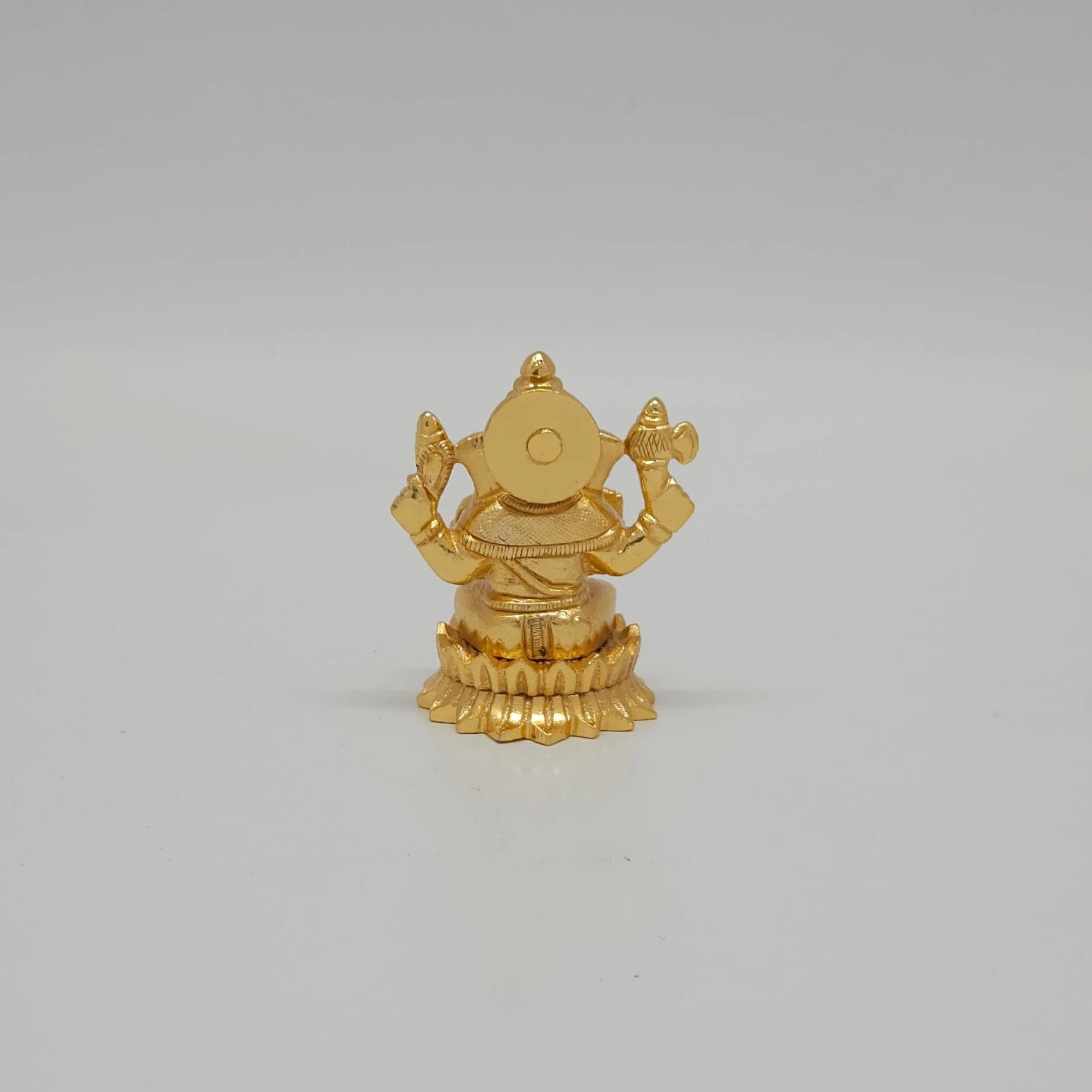 Vigneshwara Gold Idol Back View Sunburst Lotus Halo Round Pedestal Base Craftsmanship